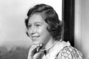 Princess Elizabeth (Queen Elizabeth II) pictured smiling with a book at Windsor Castle, Berkshire, Great Britain, 22 June 1940. (Photo by Lisa Sheridan/Studio Lisa/Getty Images)
